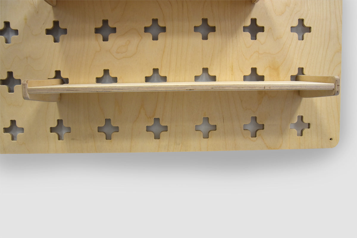 Hängande hylla för verktygsvägg